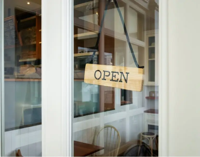a sign that says open