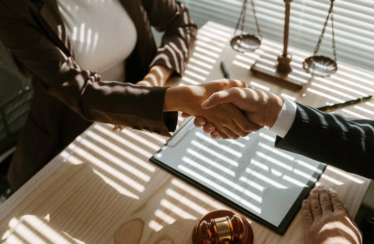 Lawyers are shaking hands