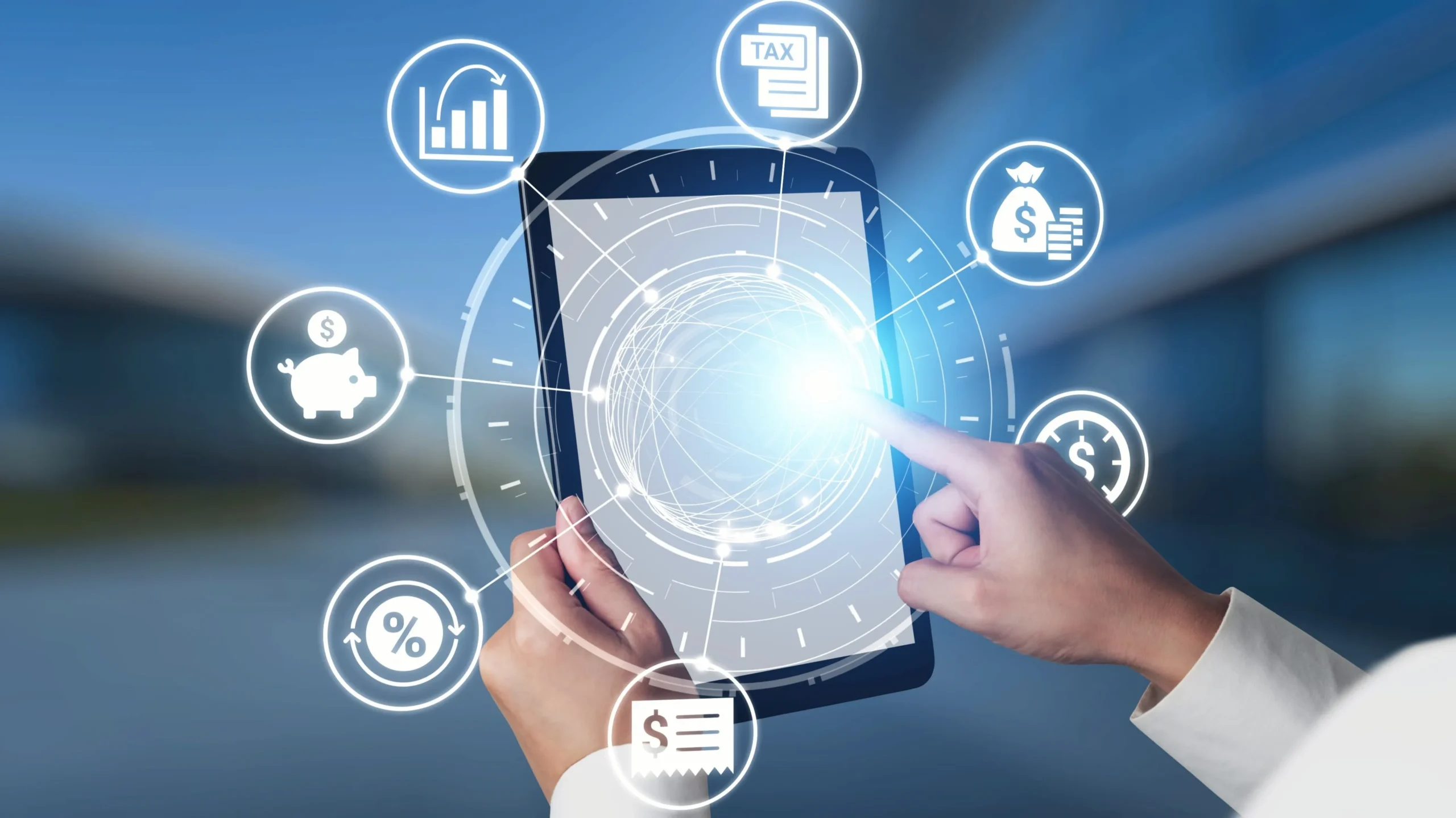 Person interacting with a digital tablet displaying financial icons and holographic interface.